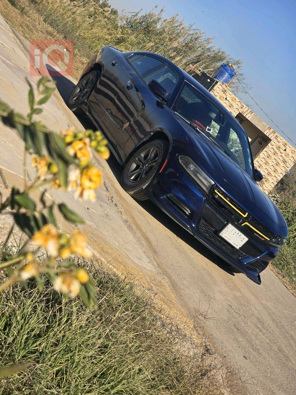 دۆج چارجەر